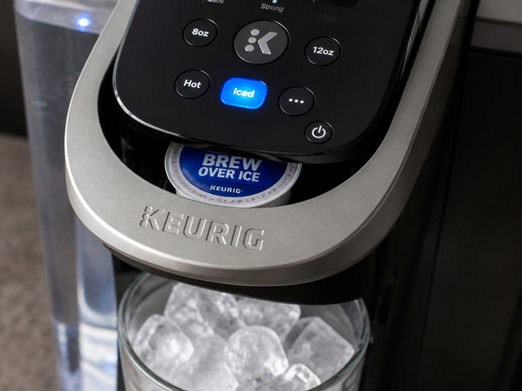 Keurig machine with dedicated Iced button for brewing coffee over ice